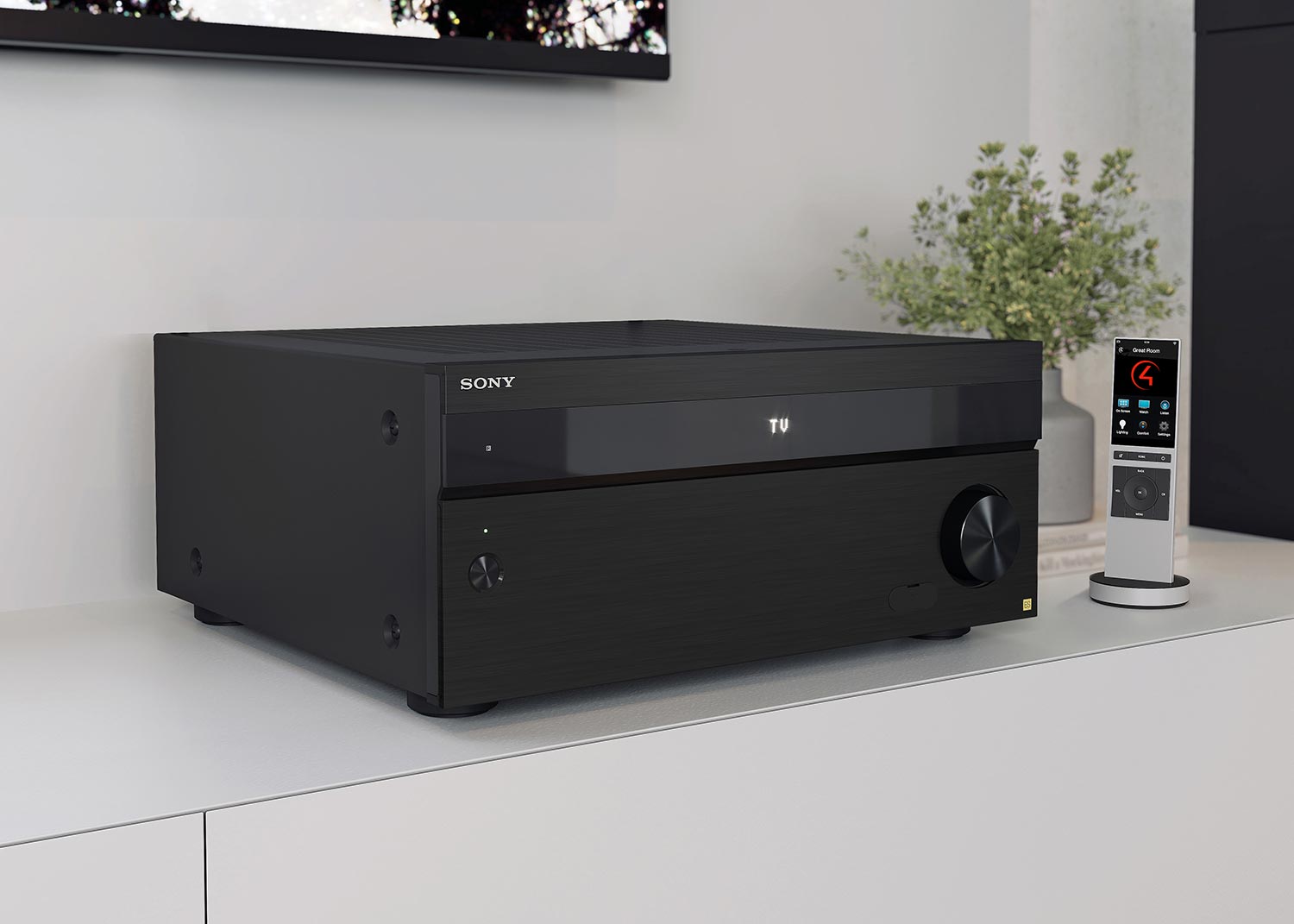 Closeup ES Receiver on ent console front panel ON & Control4 remote control (AZ7000)