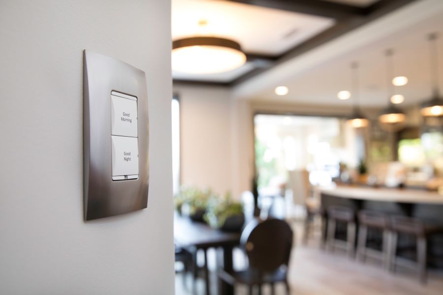 A Control4 smart home displaying a keypad with ‘Good Morning’ and ‘Good Night’ buttons.