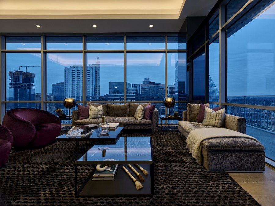 Lutron lighting in a living room overlooking a city. 